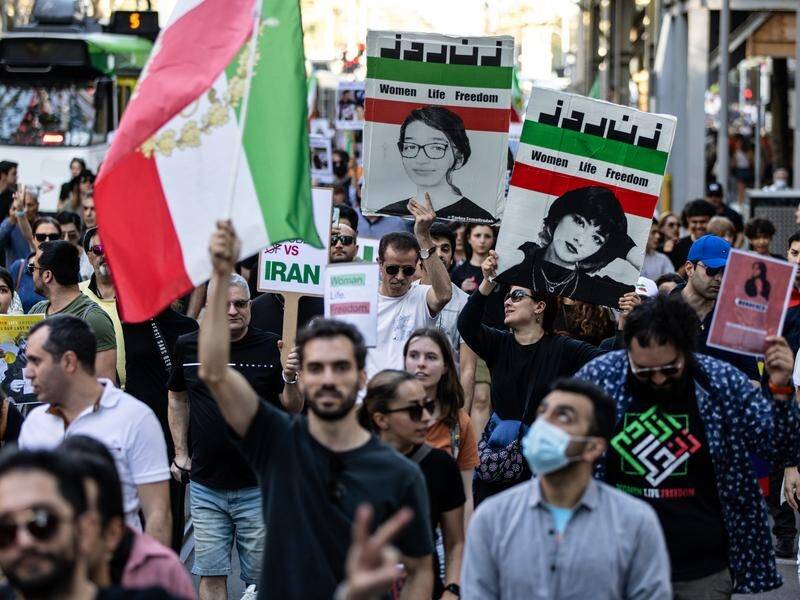 Rallies across Australia have marked the anniversary of Mahsa Amini's death in custody in Iran. (Diego Fedele/AAP PHOTOS)