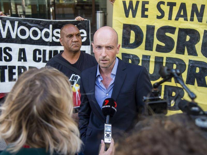 Jesse Noakes (right) and two other climate activists have pleaded not guilty. (Aaron Bunch/AAP PHOTOS)