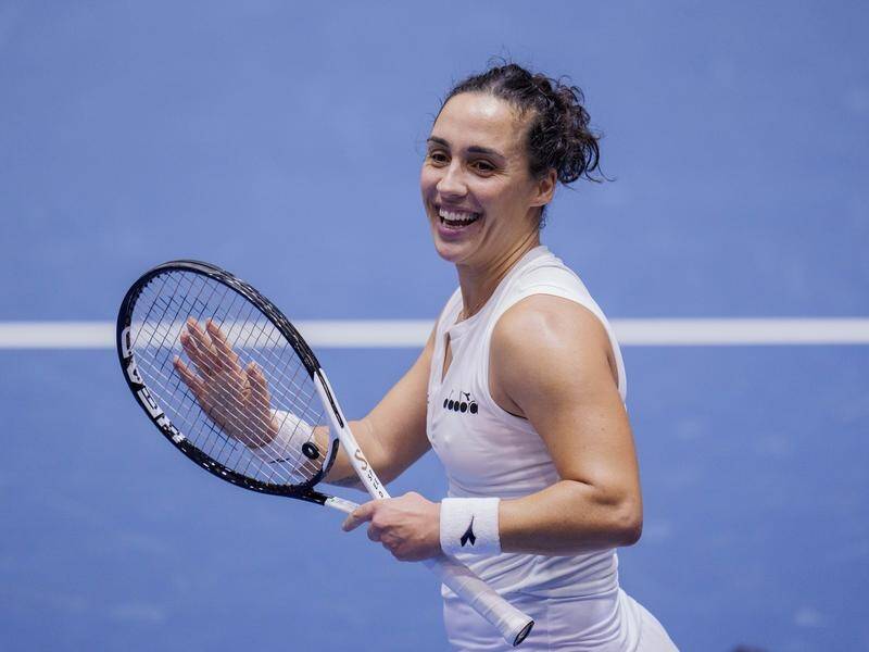 Martina Trevisan rejoices after her win over Alize Cornet at the Billie Jean King Cup Finals. (AP PHOTO)